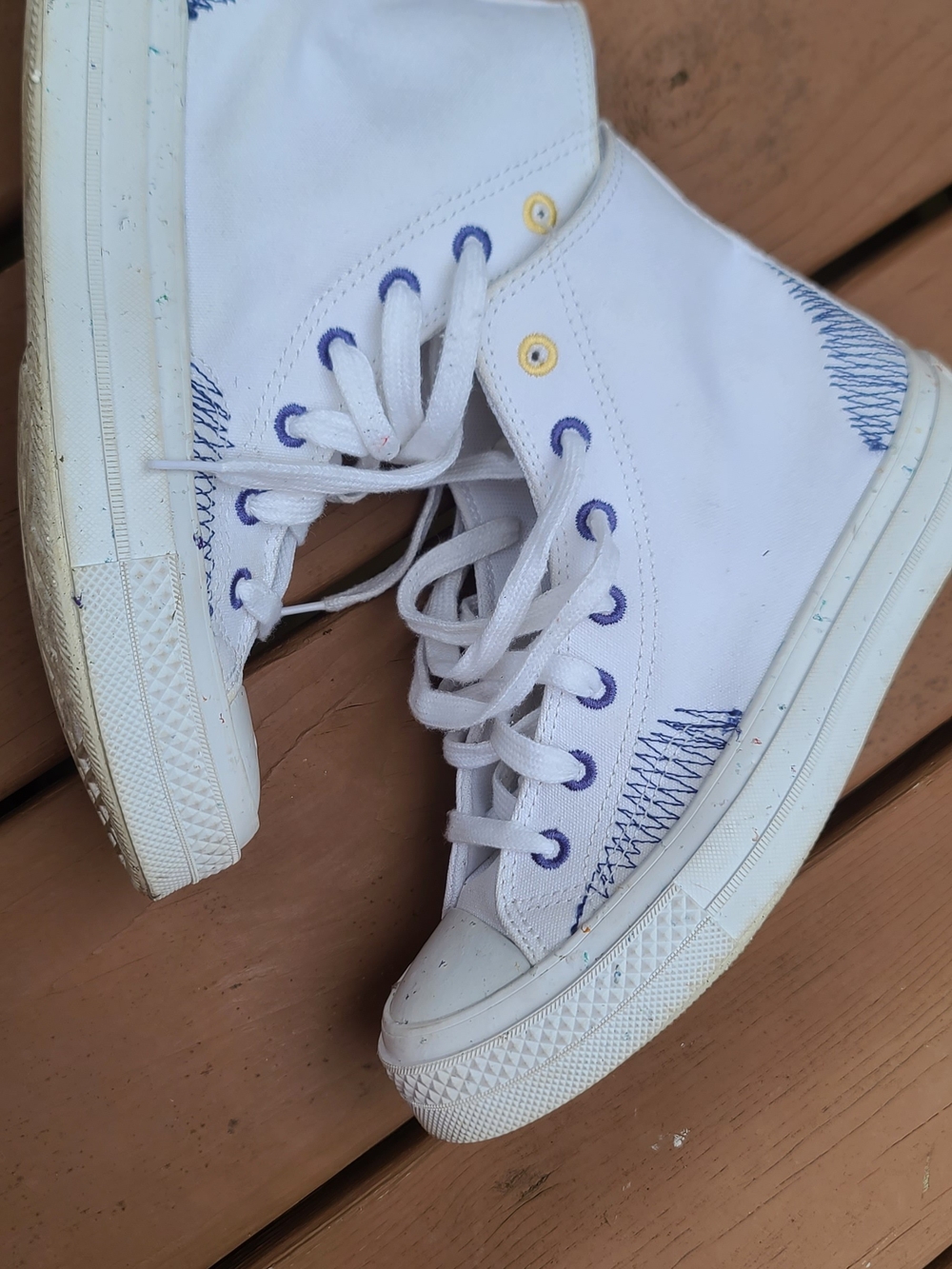 Converse White High-Top Sneakers with Purple Eyelets and Blue Stitching